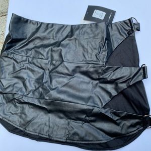 Cut out leather mini skirt